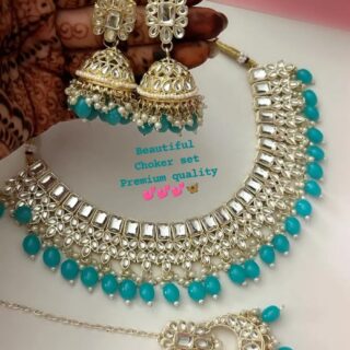 Set With Earrings And Tikka