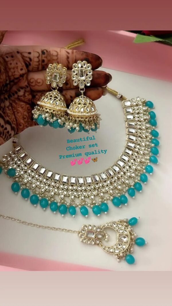 Set With Earrings And Tikka